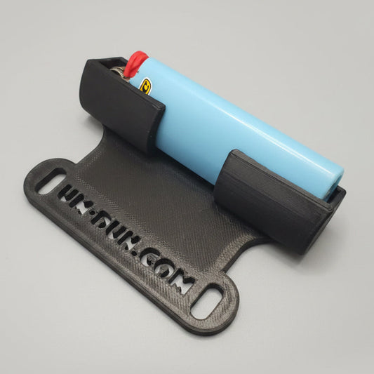 bic(ycle) holder. hard mounted lighter for 2-bolt bottle cage